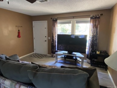 Charming and low-maintenance townhouse located in the heart of on DeSoto Golf Course in Arkansas - for sale on GolfHomes.com, golf home, golf lot