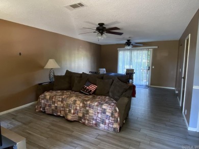 Charming and low-maintenance townhouse located in the heart of on DeSoto Golf Course in Arkansas - for sale on GolfHomes.com, golf home, golf lot