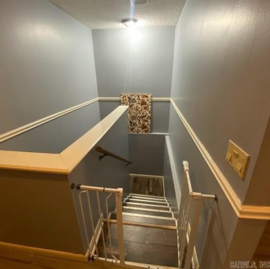 Charming and low-maintenance townhouse located in the heart of on DeSoto Golf Course in Arkansas - for sale on GolfHomes.com, golf home, golf lot