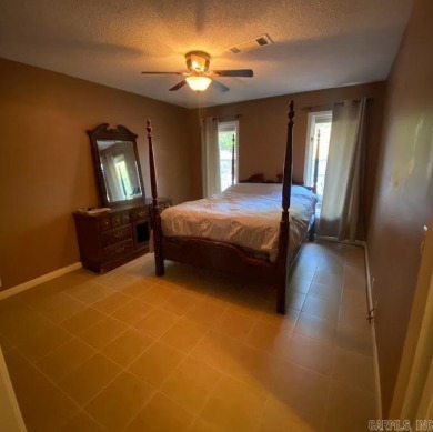 Charming and low-maintenance townhouse located in the heart of on DeSoto Golf Course in Arkansas - for sale on GolfHomes.com, golf home, golf lot