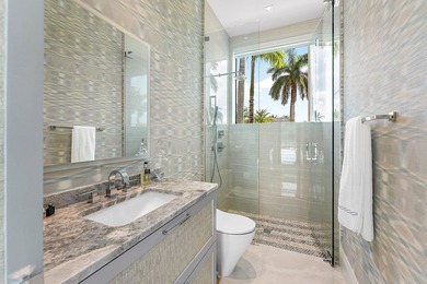 An architectural gem newly constructed in 2024, this on St. Andrews Country Club of Boca Raton in Florida - for sale on GolfHomes.com, golf home, golf lot