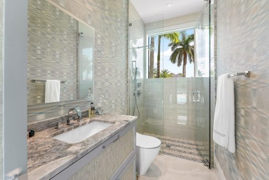An architectural gem newly constructed in 2024, this on St. Andrews Country Club of Boca Raton in Florida - for sale on GolfHomes.com, golf home, golf lot