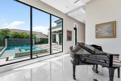 An architectural gem newly constructed in 2024, this on St. Andrews Country Club of Boca Raton in Florida - for sale on GolfHomes.com, golf home, golf lot