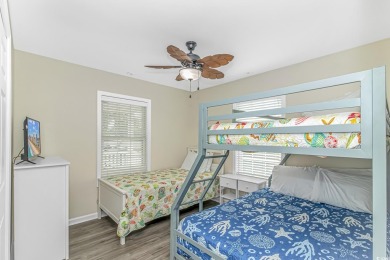 This spacious 5 Bedroom 3.5 Bath raised beach house is just a on Prestwick Country Club in South Carolina - for sale on GolfHomes.com, golf home, golf lot
