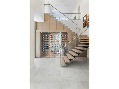 An architectural gem newly constructed in 2024, this on St. Andrews Country Club of Boca Raton in Florida - for sale on GolfHomes.com, golf home, golf lot