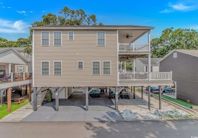This spacious 5 Bedroom 3.5 Bath raised beach house is just a on Prestwick Country Club in South Carolina - for sale on GolfHomes.com, golf home, golf lot