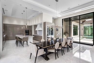 An architectural gem newly constructed in 2024, this on St. Andrews Country Club of Boca Raton in Florida - for sale on GolfHomes.com, golf home, golf lot