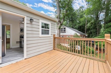 Discover this charming, updated 2-bedroom, 1-bathroom home with on John A. White Golf Course in Georgia - for sale on GolfHomes.com, golf home, golf lot