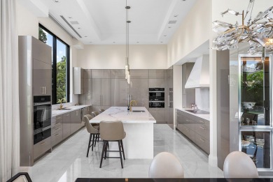 An architectural gem newly constructed in 2024, this on St. Andrews Country Club of Boca Raton in Florida - for sale on GolfHomes.com, golf home, golf lot