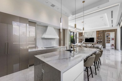 An architectural gem newly constructed in 2024, this on St. Andrews Country Club of Boca Raton in Florida - for sale on GolfHomes.com, golf home, golf lot