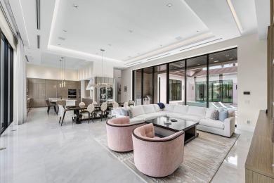 An architectural gem newly constructed in 2024, this on St. Andrews Country Club of Boca Raton in Florida - for sale on GolfHomes.com, golf home, golf lot