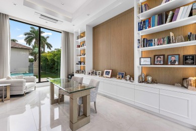 An architectural gem newly constructed in 2024, this on St. Andrews Country Club of Boca Raton in Florida - for sale on GolfHomes.com, golf home, golf lot
