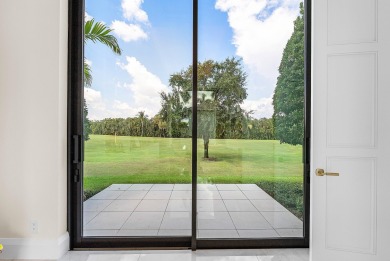An architectural gem newly constructed in 2024, this on St. Andrews Country Club of Boca Raton in Florida - for sale on GolfHomes.com, golf home, golf lot