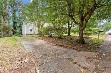 Discover this charming, updated 2-bedroom, 1-bathroom home with on John A. White Golf Course in Georgia - for sale on GolfHomes.com, golf home, golf lot