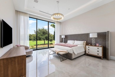 An architectural gem newly constructed in 2024, this on St. Andrews Country Club of Boca Raton in Florida - for sale on GolfHomes.com, golf home, golf lot