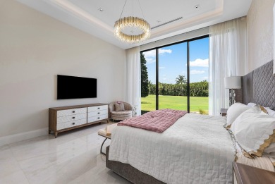 An architectural gem newly constructed in 2024, this on St. Andrews Country Club of Boca Raton in Florida - for sale on GolfHomes.com, golf home, golf lot