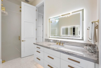 An architectural gem newly constructed in 2024, this on St. Andrews Country Club of Boca Raton in Florida - for sale on GolfHomes.com, golf home, golf lot