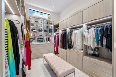 An architectural gem newly constructed in 2024, this on St. Andrews Country Club of Boca Raton in Florida - for sale on GolfHomes.com, golf home, golf lot