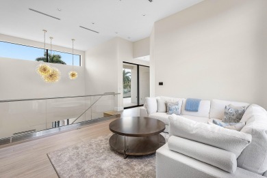 An architectural gem newly constructed in 2024, this on St. Andrews Country Club of Boca Raton in Florida - for sale on GolfHomes.com, golf home, golf lot