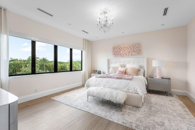 An architectural gem newly constructed in 2024, this on St. Andrews Country Club of Boca Raton in Florida - for sale on GolfHomes.com, golf home, golf lot