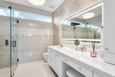 An architectural gem newly constructed in 2024, this on St. Andrews Country Club of Boca Raton in Florida - for sale on GolfHomes.com, golf home, golf lot