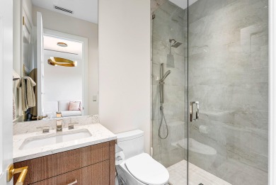 An architectural gem newly constructed in 2024, this on St. Andrews Country Club of Boca Raton in Florida - for sale on GolfHomes.com, golf home, golf lot