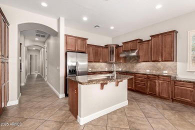 RESORT STYLE LIVING AT ITS BEST! Stellar TW Lewis home in gated on Estrella Mountain Ranch Golf Course in Arizona - for sale on GolfHomes.com, golf home, golf lot