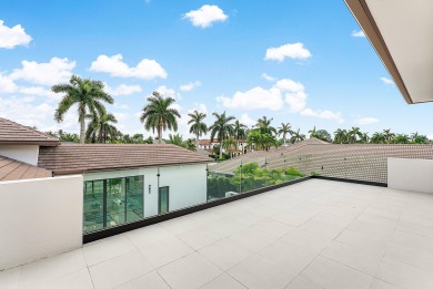 An architectural gem newly constructed in 2024, this on St. Andrews Country Club of Boca Raton in Florida - for sale on GolfHomes.com, golf home, golf lot