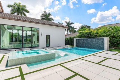 An architectural gem newly constructed in 2024, this on St. Andrews Country Club of Boca Raton in Florida - for sale on GolfHomes.com, golf home, golf lot