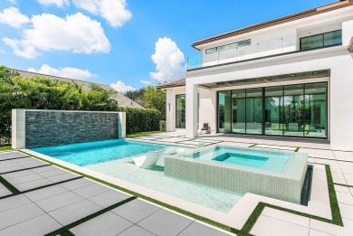 An architectural gem newly constructed in 2024, this on St. Andrews Country Club of Boca Raton in Florida - for sale on GolfHomes.com, golf home, golf lot