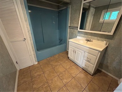 PRICE IMPROVEMENT! This 2-story home offers over 1800 sq ft with on Bay Breeze Golf Links in New York - for sale on GolfHomes.com, golf home, golf lot