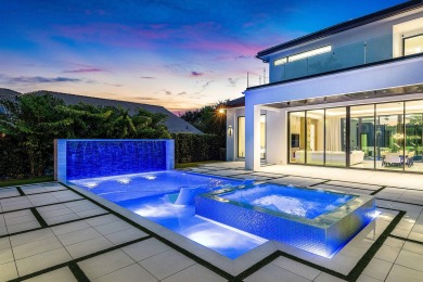 An architectural gem newly constructed in 2024, this on St. Andrews Country Club of Boca Raton in Florida - for sale on GolfHomes.com, golf home, golf lot
