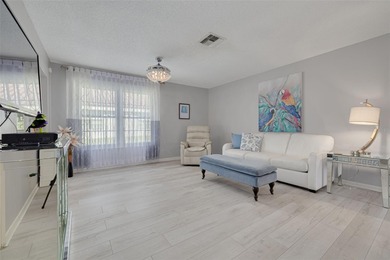 Located in The Mainlands of Tamarac by the Gulf - a premier 55+ on Mainlands Golf Club in Florida - for sale on GolfHomes.com, golf home, golf lot