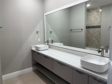 Experience elevated living in this BRAND-NEW, never lived in on Providence Golf Club in Florida - for sale on GolfHomes.com, golf home, golf lot