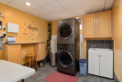 Step into a world of refined elegance in this one-of-a-kind, 2 on Great Rock Golf Club in New York - for sale on GolfHomes.com, golf home, golf lot