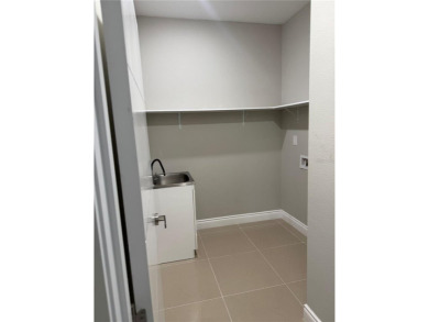 Experience elevated living in this BRAND-NEW, never lived in on Providence Golf Club in Florida - for sale on GolfHomes.com, golf home, golf lot