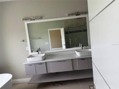 Experience elevated living in this BRAND-NEW, never lived in on Providence Golf Club in Florida - for sale on GolfHomes.com, golf home, golf lot