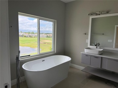 Experience elevated living in this BRAND-NEW, never lived in on Providence Golf Club in Florida - for sale on GolfHomes.com, golf home, golf lot