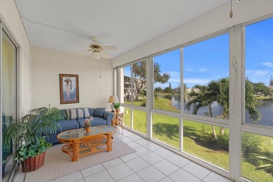 BEAUTIFUL WATERFRONT CONDO | MOVE-IN READY | HIGHLY DESIRABLE on Hillsboro Pines Golf in Florida - for sale on GolfHomes.com, golf home, golf lot