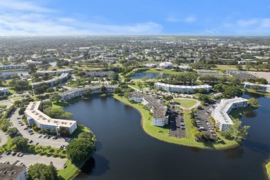 BEAUTIFUL WATERFRONT CONDO | MOVE-IN READY | HIGHLY DESIRABLE on Hillsboro Pines Golf in Florida - for sale on GolfHomes.com, golf home, golf lot