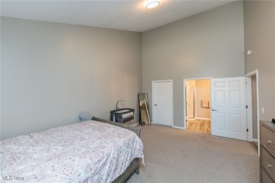 Welcome to this beautiful two-story lofted condo located in the on  in Ohio - for sale on GolfHomes.com, golf home, golf lot