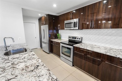 Step into Deer Creek's most sought-after villa--where modern on Deer Creek Golf Club in Florida - for sale on GolfHomes.com, golf home, golf lot