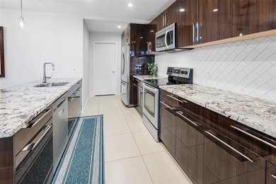 Step into Deer Creek's most sought-after villa--where modern on Deer Creek Golf Club in Florida - for sale on GolfHomes.com, golf home, golf lot