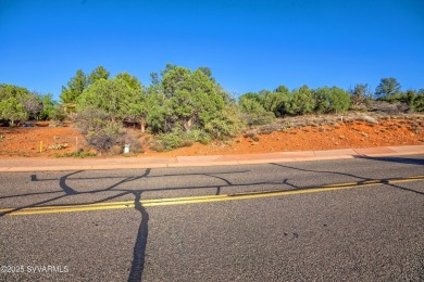 Embrace the essence of Sedona living atop this .30-acre hillside on Canyon Mesa Country Club in Arizona - for sale on GolfHomes.com, golf home, golf lot