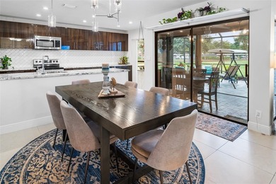 Step into Deer Creek's most sought-after villa--where modern on Deer Creek Golf Club in Florida - for sale on GolfHomes.com, golf home, golf lot