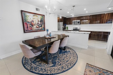 Step into Deer Creek's most sought-after villa--where modern on Deer Creek Golf Club in Florida - for sale on GolfHomes.com, golf home, golf lot