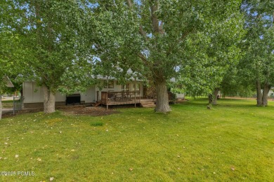 Welcome to your own private slice of Midway paradise where on Homestead Golf Club and Resort in Utah - for sale on GolfHomes.com, golf home, golf lot