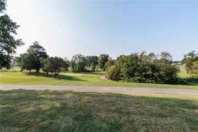 Welcome to this beautiful two-story lofted condo located in the on Fox Creek Golf and Racquet Club in Ohio - for sale on GolfHomes.com, golf home, golf lot
