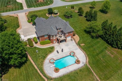 ENVISION the lifestyle that this comfortably grand masterpiece on Southwick Golf Course in North Carolina - for sale on GolfHomes.com, golf home, golf lot