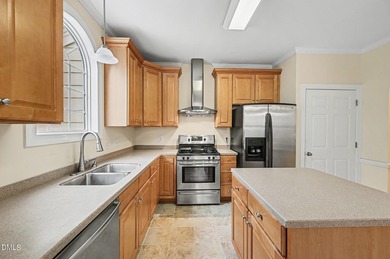 Welcome home to this well maintained, one-owner end-unit on Devils Ridge Golf Club in North Carolina - for sale on GolfHomes.com, golf home, golf lot